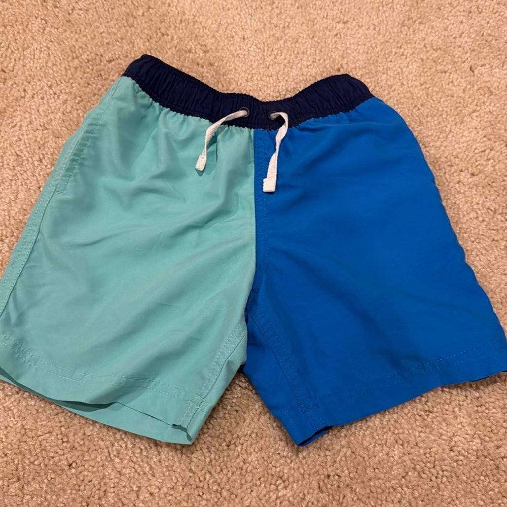 Boys never worn swim trunks